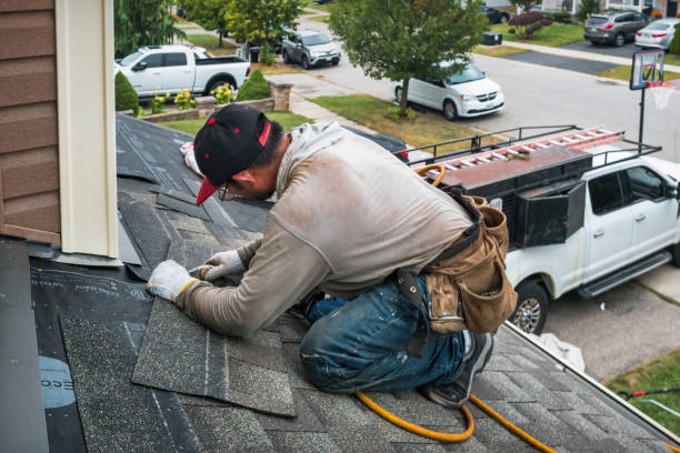 Professional Roofing technician working in Quinebaug, CT